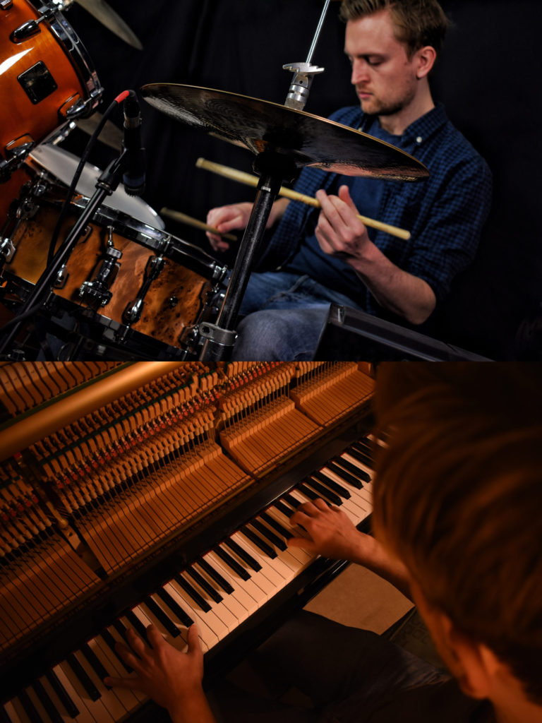 Will Jackson playing drums and piano